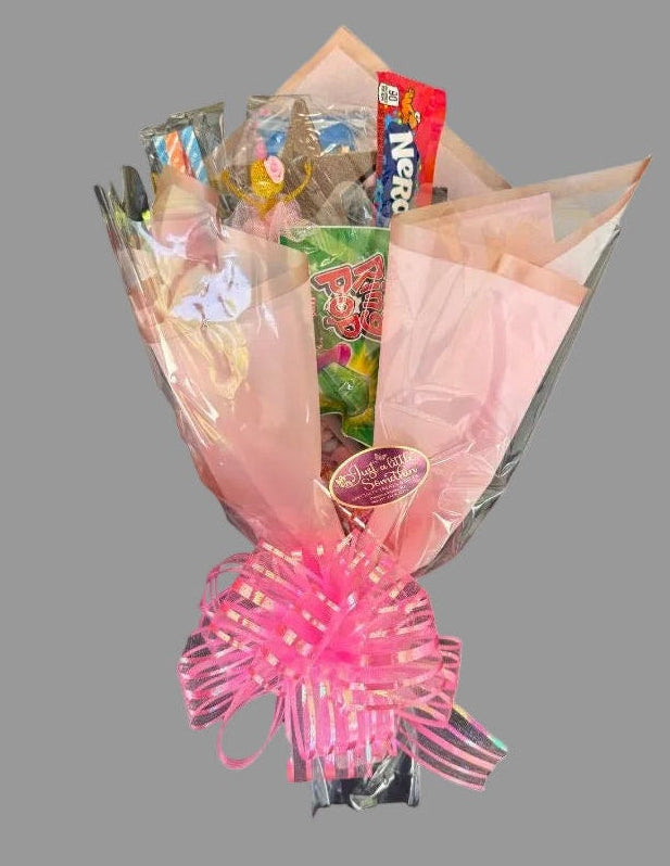Bouquet of wrapped candy and chocolate. Designs may vary.